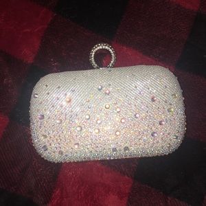 Silver and iridescent jeweled clutch